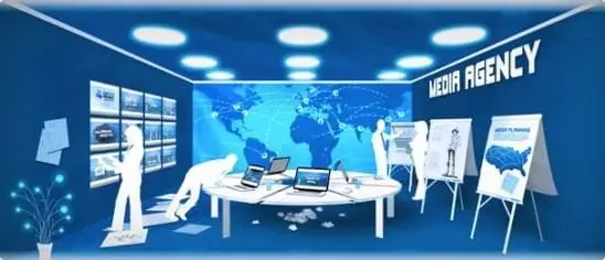 a group of people working in an office