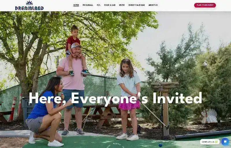 a man and two children playing mini golf