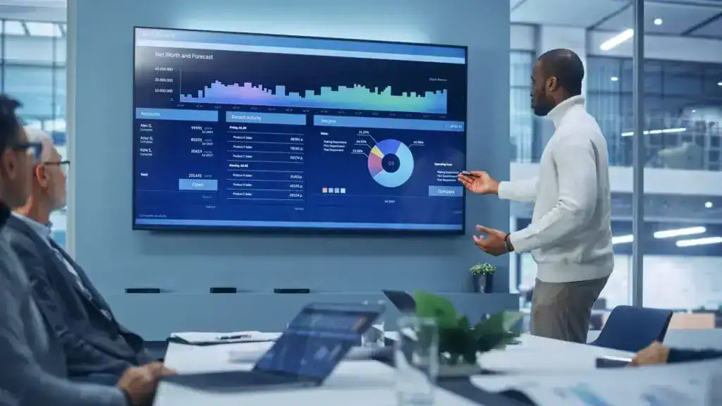 man giving a presentation of marketing graph