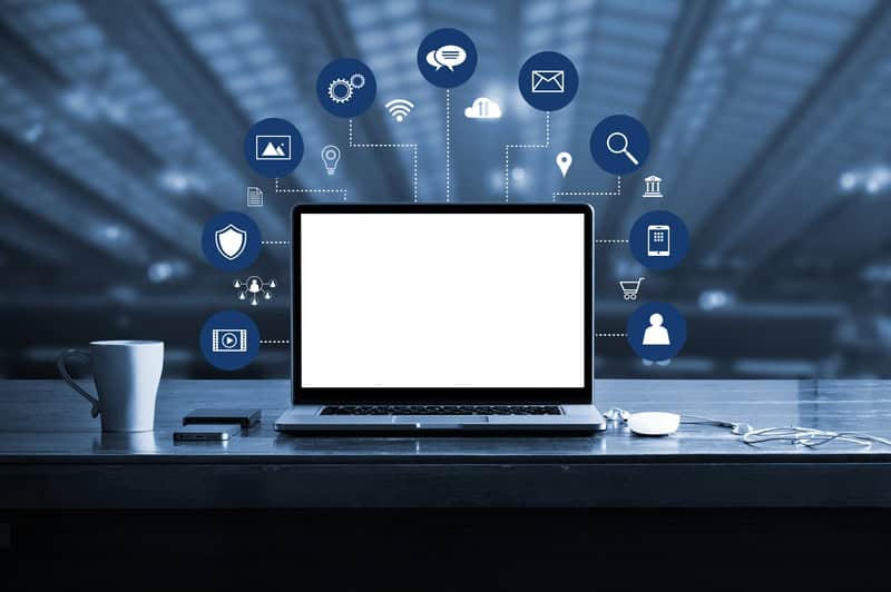 Digital marketing. laptop computer with white screen blank and virtual icon digital marketing network connection.